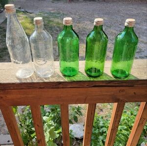 Vintage Mountain Dew and PEPSI Bottles